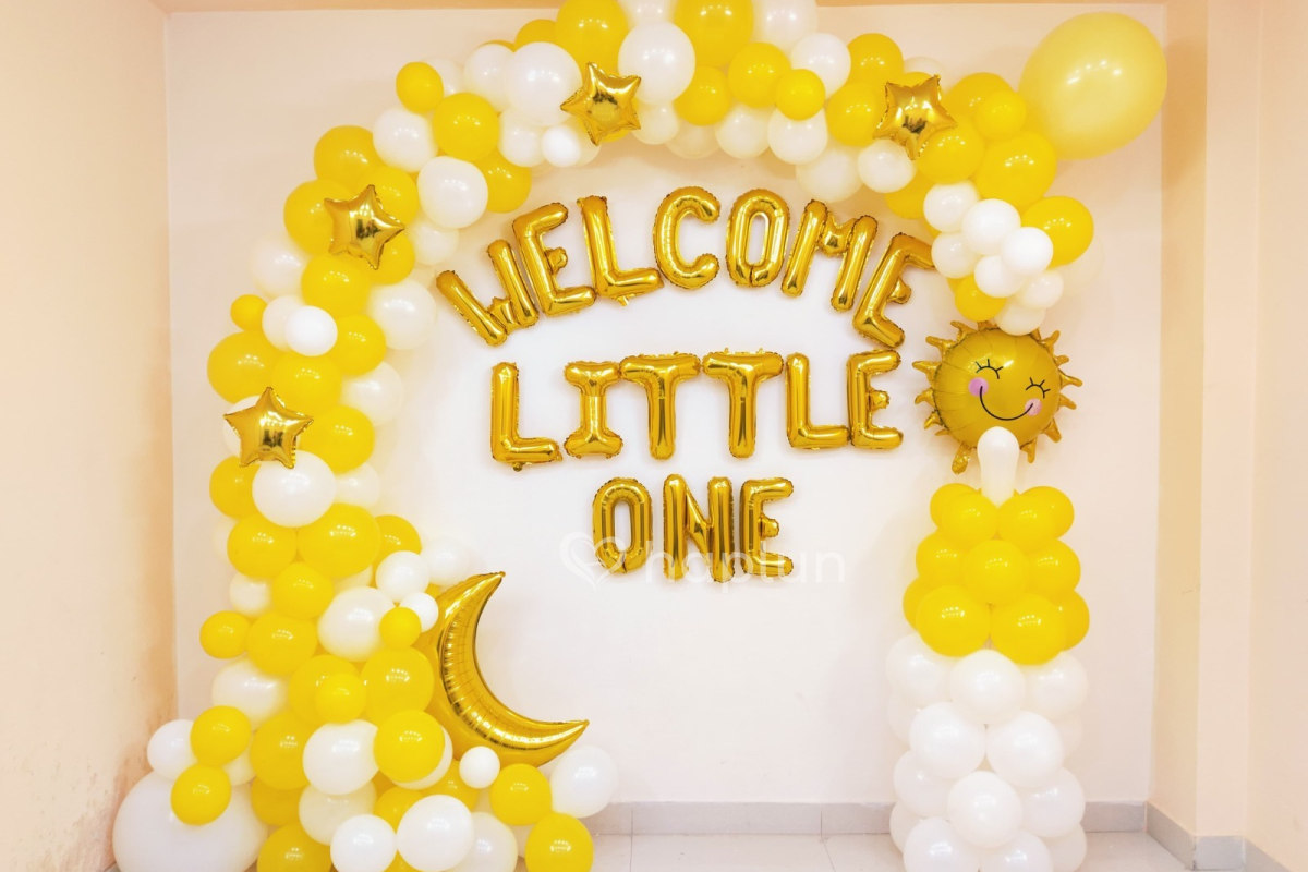 Yellow and White Baby Arrive Decor