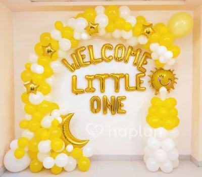Yellow and White Baby Arrive Decor
