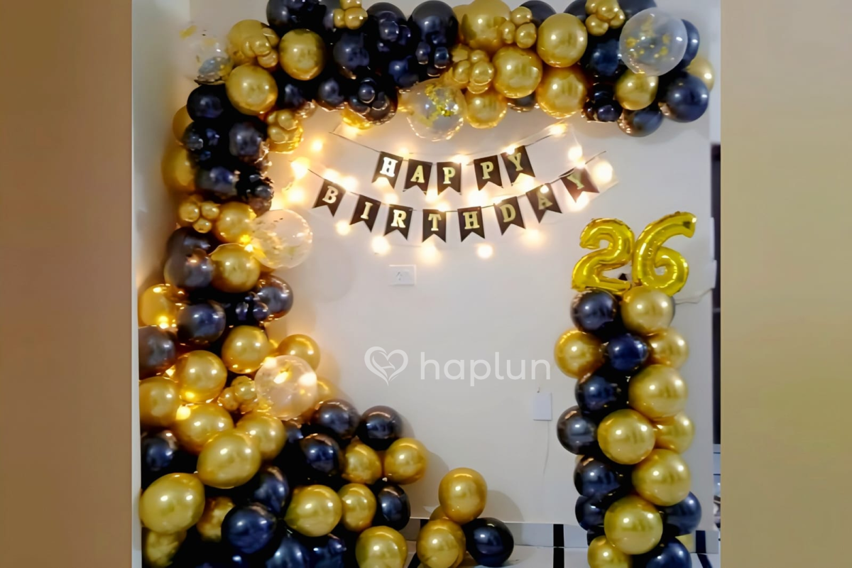 black and golden balloon decoration for birthday