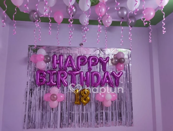pink theme birthday decoration on wall